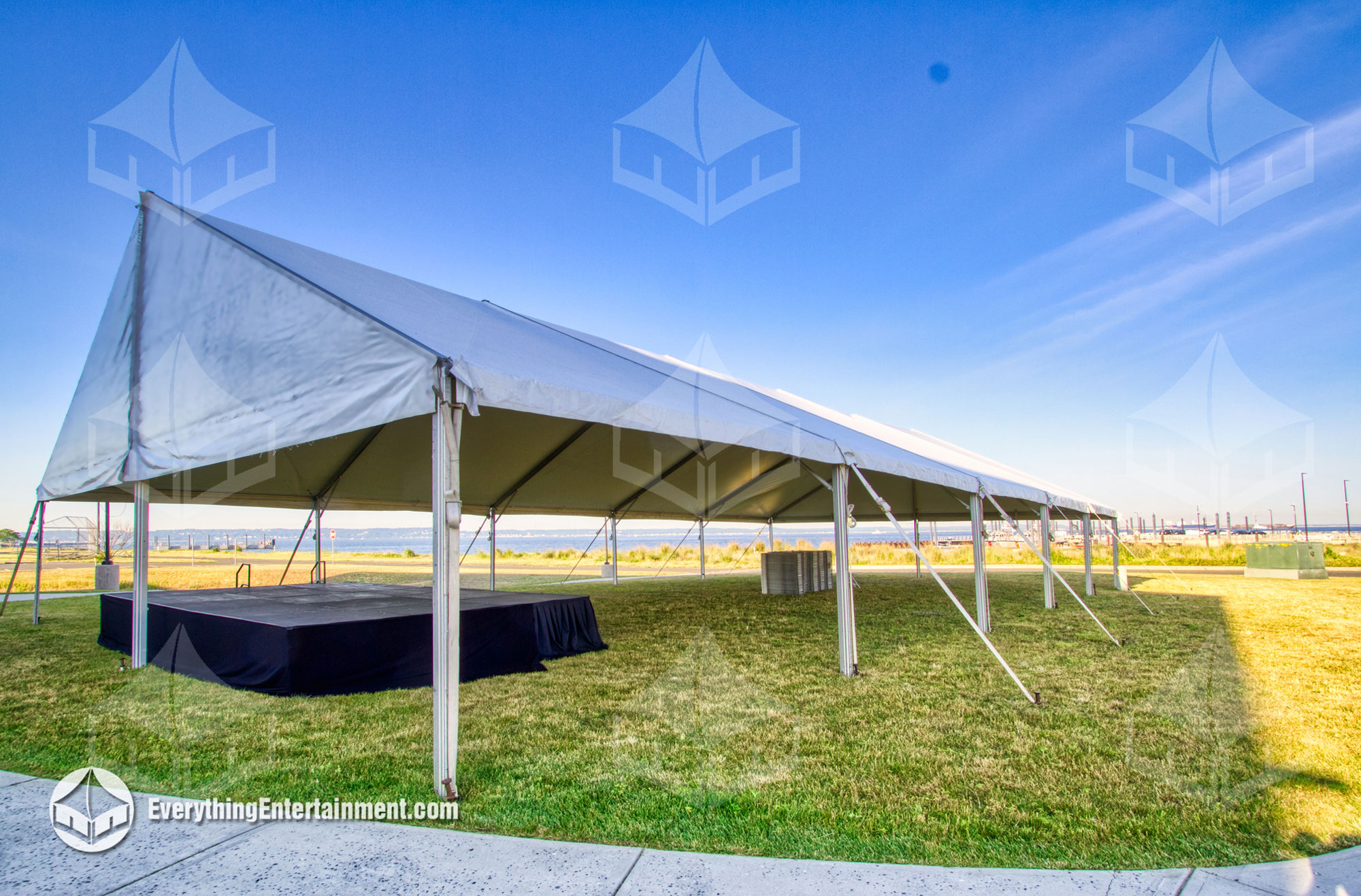 40x75 Maxi-Frame Tent setup overlooking the water.