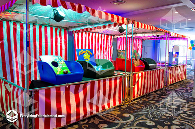 red and white striped carnival set up in side catering hall for party