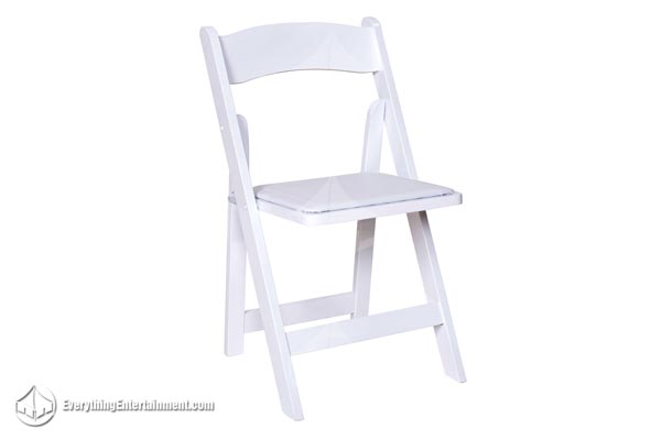 White resin folding chair with padded seat for wedding ceremony rentals on white background