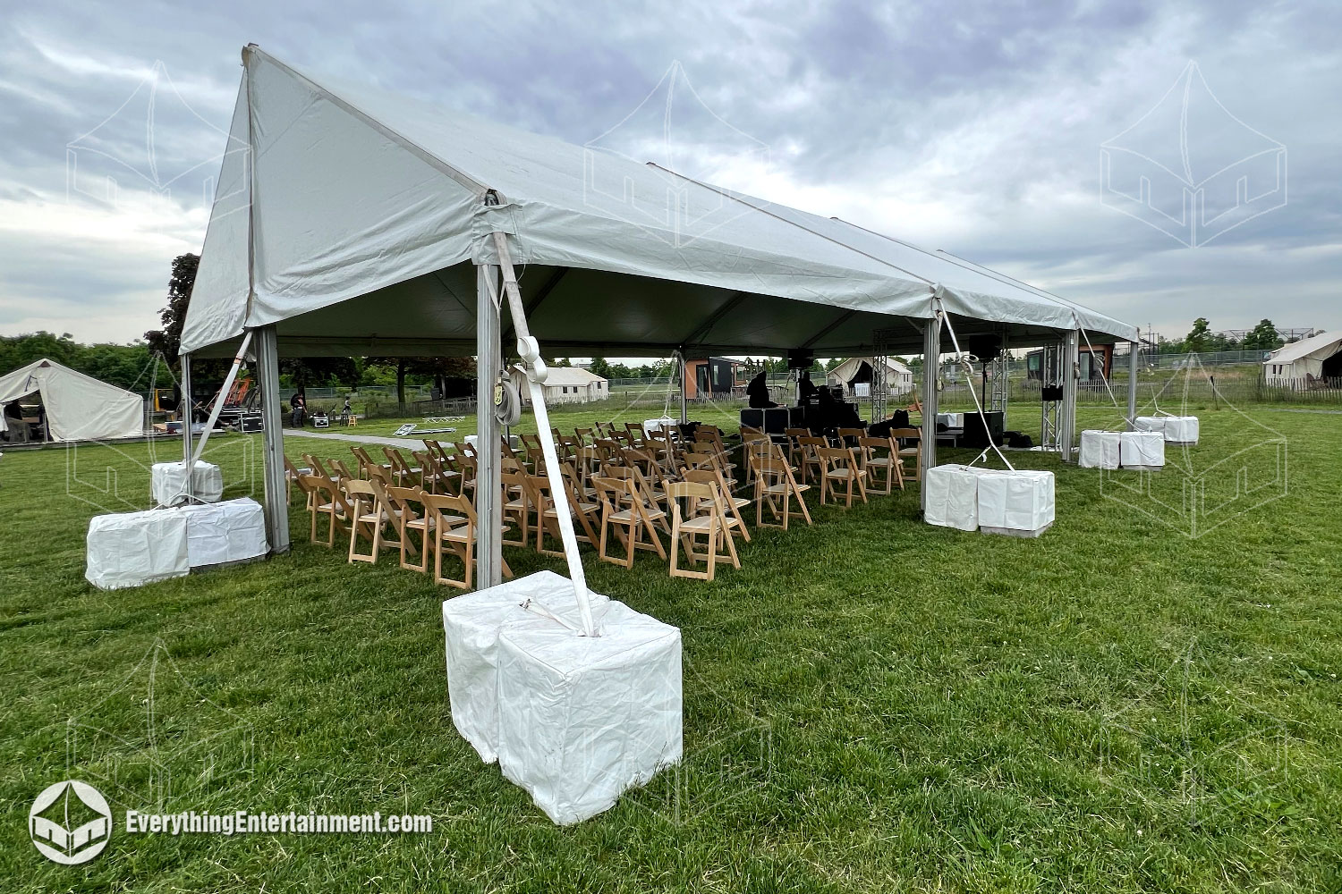 30x45 gable ended frame tent set up on Governors Island, NY, providing a sturdy and spacious event space with an open layout.