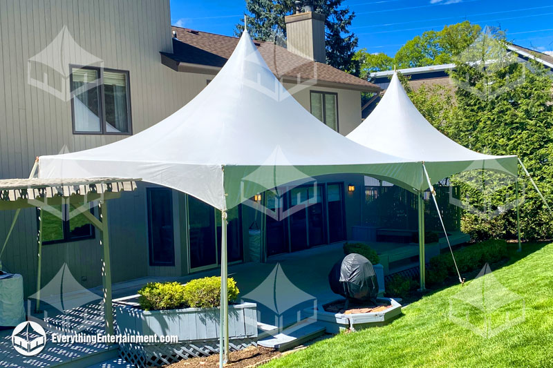 Two 15x20 high peak marquee tents guttered together to create a 15x40 event space